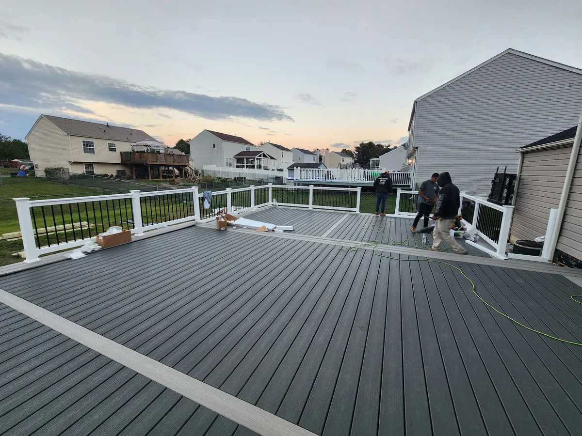 Composite deck build with railing in progress by TWOMENS crew